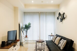 Room | Living area | TV - Exclusive 1BR Branz BSD City Apartment (Pagedangan)
