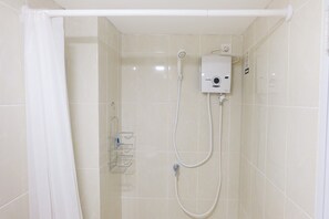 Room | Bathroom - Comfy Studio Apartment with Extra Bed at M-Town Residence (Gading Serpong)