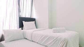 2 habitaciones, escritorio, wifi gratis y ropa de cama