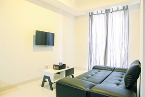 Room | Living room | Flat-screen TV - Wonderful 2BR at Gold Coast Apartment Pantai Indah Kapuk (Jakarta)
