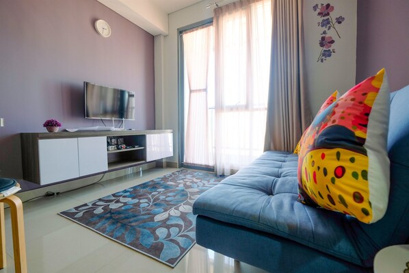 Quarto | Área de estar | TV