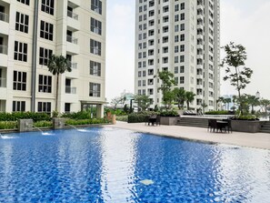 Outdoor pool - Elegant 2BR Apartment at M-Town Signature near Shopping Mall (Gading Serpong)