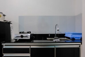 Private kitchen - New Furnished and Homey Studio Poris 88 Apartment (Tangerang)