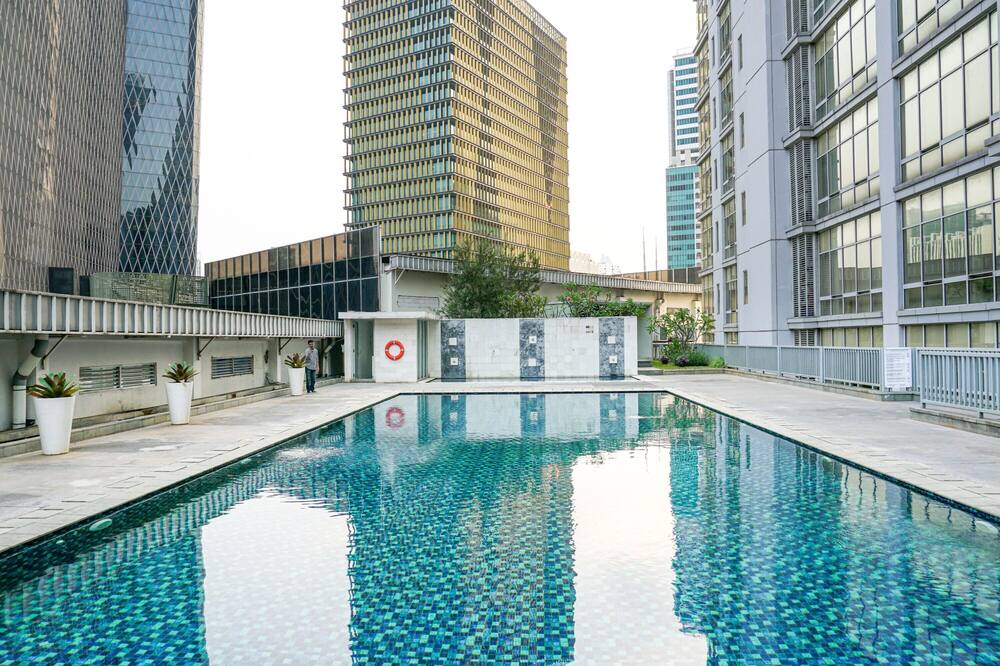 Modern Furnished 2BR at The Empyreal Condominium Epicentrum Apartment