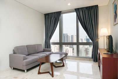 Modern and Comfortable 2BR at The Empyreal Condominium Epicentrum Apartment