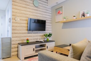 Living area - Elegant and Cozy 1BR Apartment at Bintaro Plaza Residence (South Tangerang)