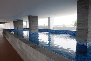 Outdoor pool - Comfortable and Fully Furnished Studio at Poris 88 Apartment (Tangerang)