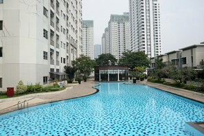 Outdoor pool - Trendy & Relaxing 2BR at The Suite Metro Apartment (Bandung)