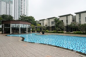 Outdoor pool - Trendy & Relaxing 2BR at The Suite Metro Apartment (Bandung)