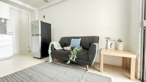 Quarto | Área de estar | TV
