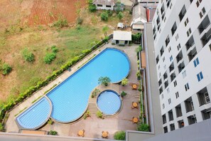 Outdoor pool - Highest Value Studio Apartment at Parkland Avenue (South Tangerang)