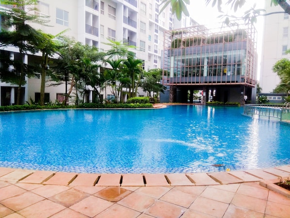 Outdoor pool - Elegant 1BR Apartment Scientia Residences near Summarecon Mall Serpong (Gading Serpong)