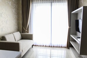 Room | Living room | TV - Minimalist 1BR Apartment at M-Town Signature (Gading Serpong)