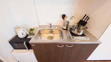 Apartment | Private kitchenette | Fridge, microwave, stovetop, electric kettle