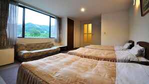 A hotel room with two beds, a sofa, a large window with a view of greenery, and a door leading to another room. - Pension Shadow Classe (Otaru)