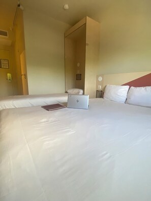 Triple Room (with a large bed and a single bed) | Desk, blackout curtains, iron/ironing board, free WiFi