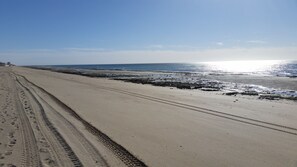 On the beach, sun loungers