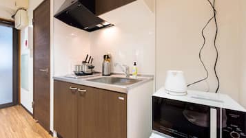 Apartment | Private kitchenette | Fridge, microwave, stovetop, electric kettle