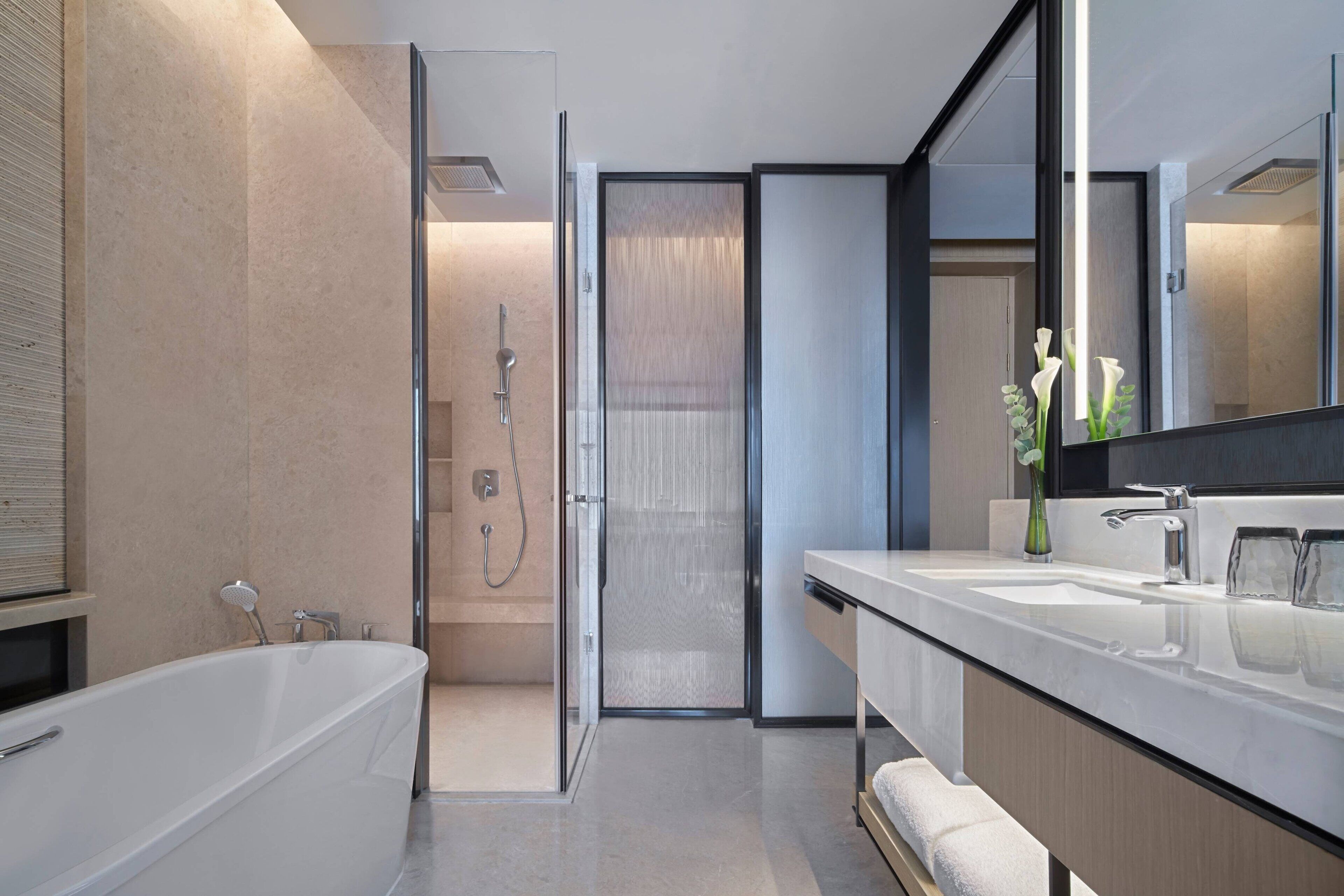 separate bathtub and shower, free toiletries, hair dryer, bathrobes