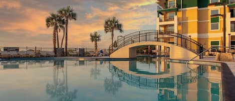 Outdoor pool, open 9:00 AM to 10:00 PM, pool umbrellas, sun loungers