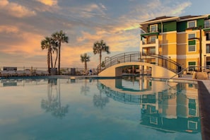 Outdoor pool, open 9:00 AM to 10:00 PM, pool umbrellas, sun loungers