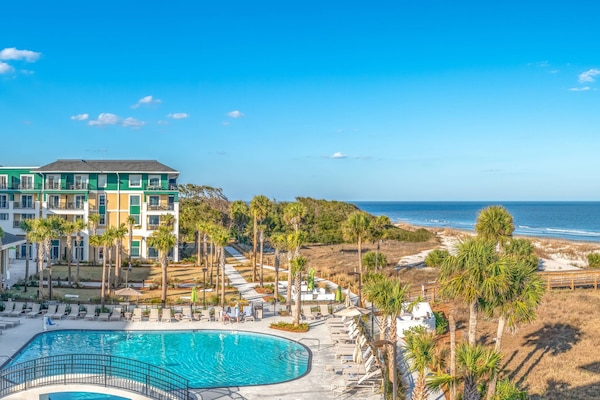 Outdoor pool, open 9:00 AM to 10:00 PM, pool umbrellas, sun loungers