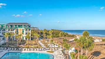 Outdoor pool, open 9:00 AM to 10:00 PM, pool umbrellas, pool loungers