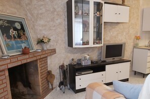 Télévision, cheminée