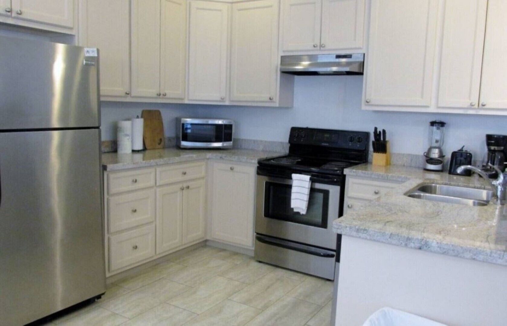 Red Fish Condo A, with boat slips and pool.