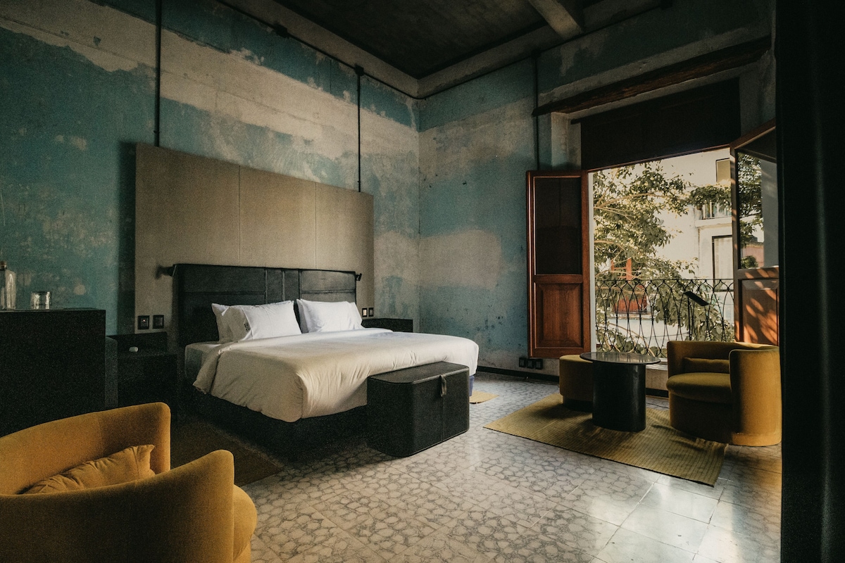 rustic chic hotel room at Pug Seal Oaxaca boutique hotel