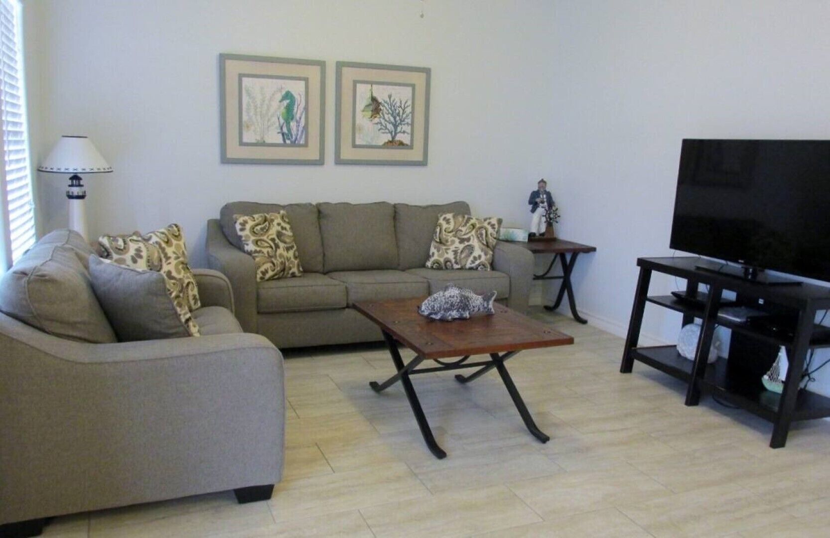 Red Fish Condo B, with boat slips and pool.