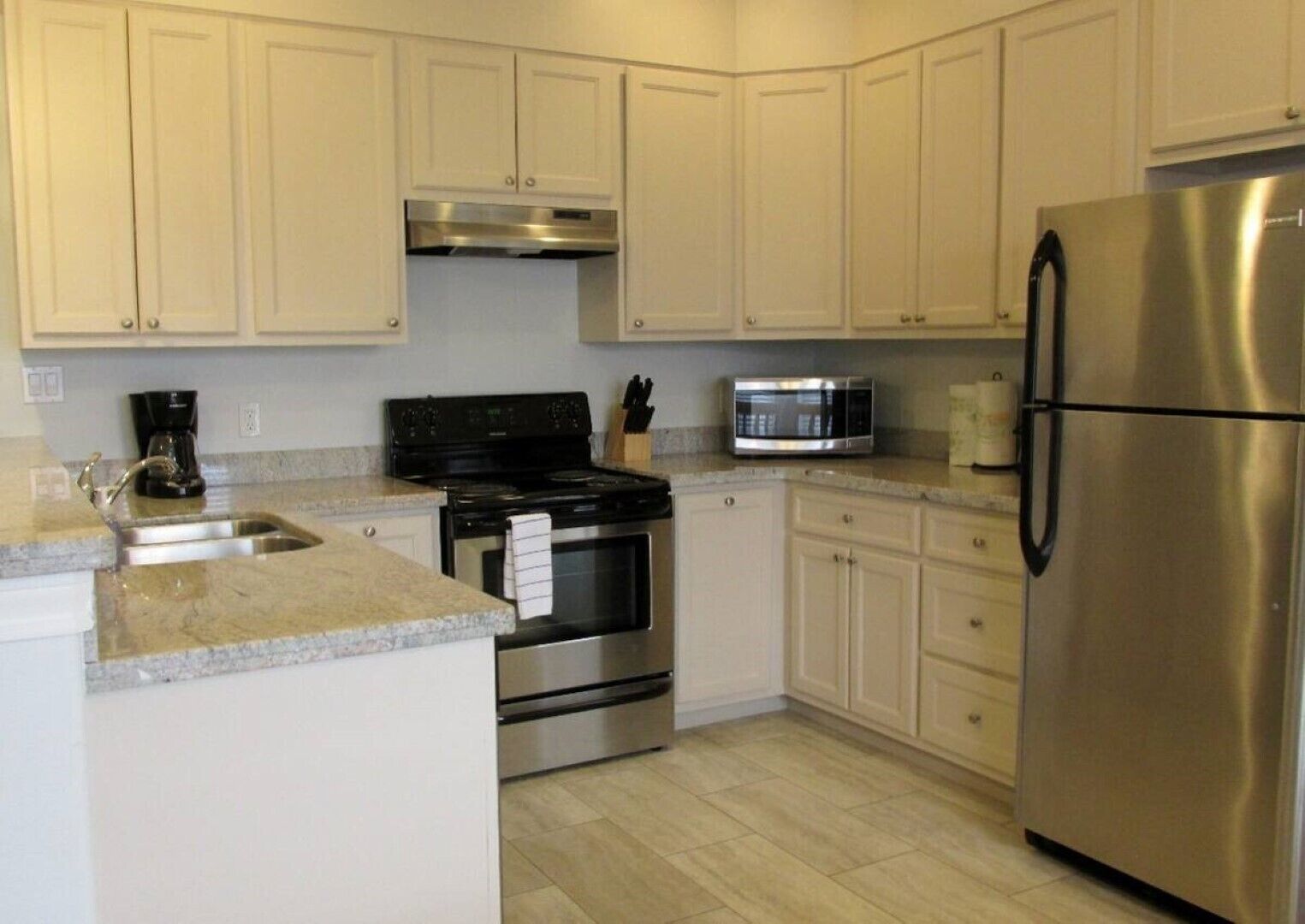 Red Fish Condo B, with boat slips and pool.