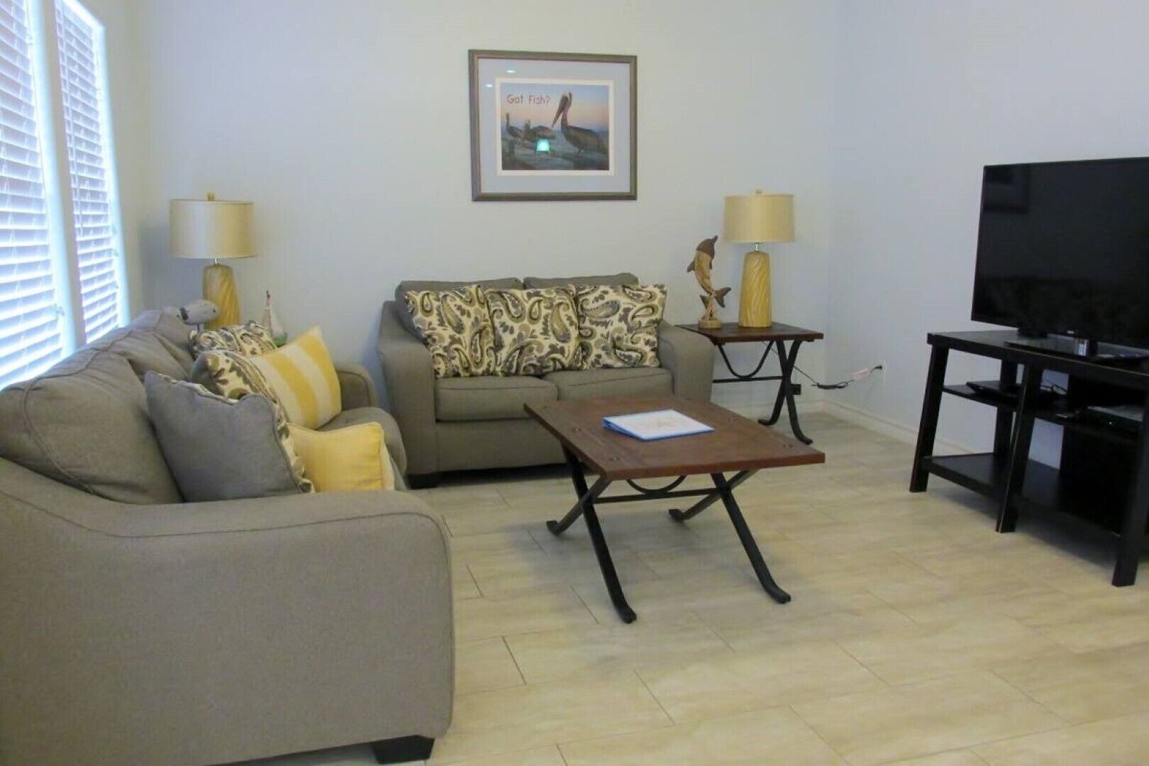 Red Fish Condo D, with boat slips and pool.