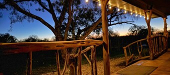 Upscale modern-rustic cabin on riverfront ranch. Near Colorado Bend State Park.
