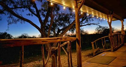 Upscale modern-rustic cabin on riverfront ranch. Near Colorado Bend State Park.