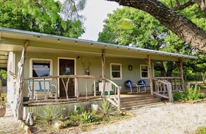 Exterior - Cabin on secluded wildlife ranch. Hot tub. Dark skies. 1/2 mile river frontage. (Lometa)