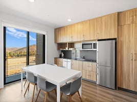 1 Bedroom Family Premium | Private kitchen | Full-size fridge, microwave, stovetop, dishwasher