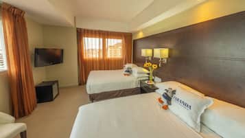 Premium bedding, down comforters, minibar, in-room safe