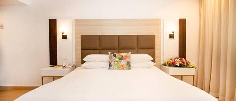 Suite, 1 chambre, non-fumeur (1 King Bed) | Literie de qualité, couette en duvet, minibar, coffre-fort