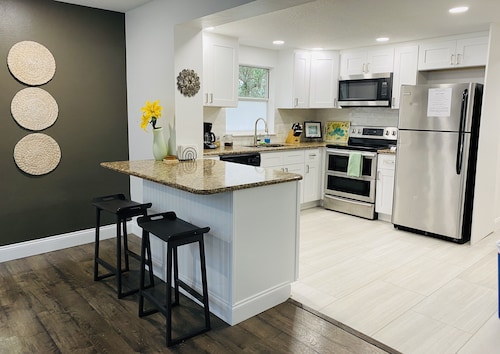 The Launch Pad with a pool! King bed and private backyard