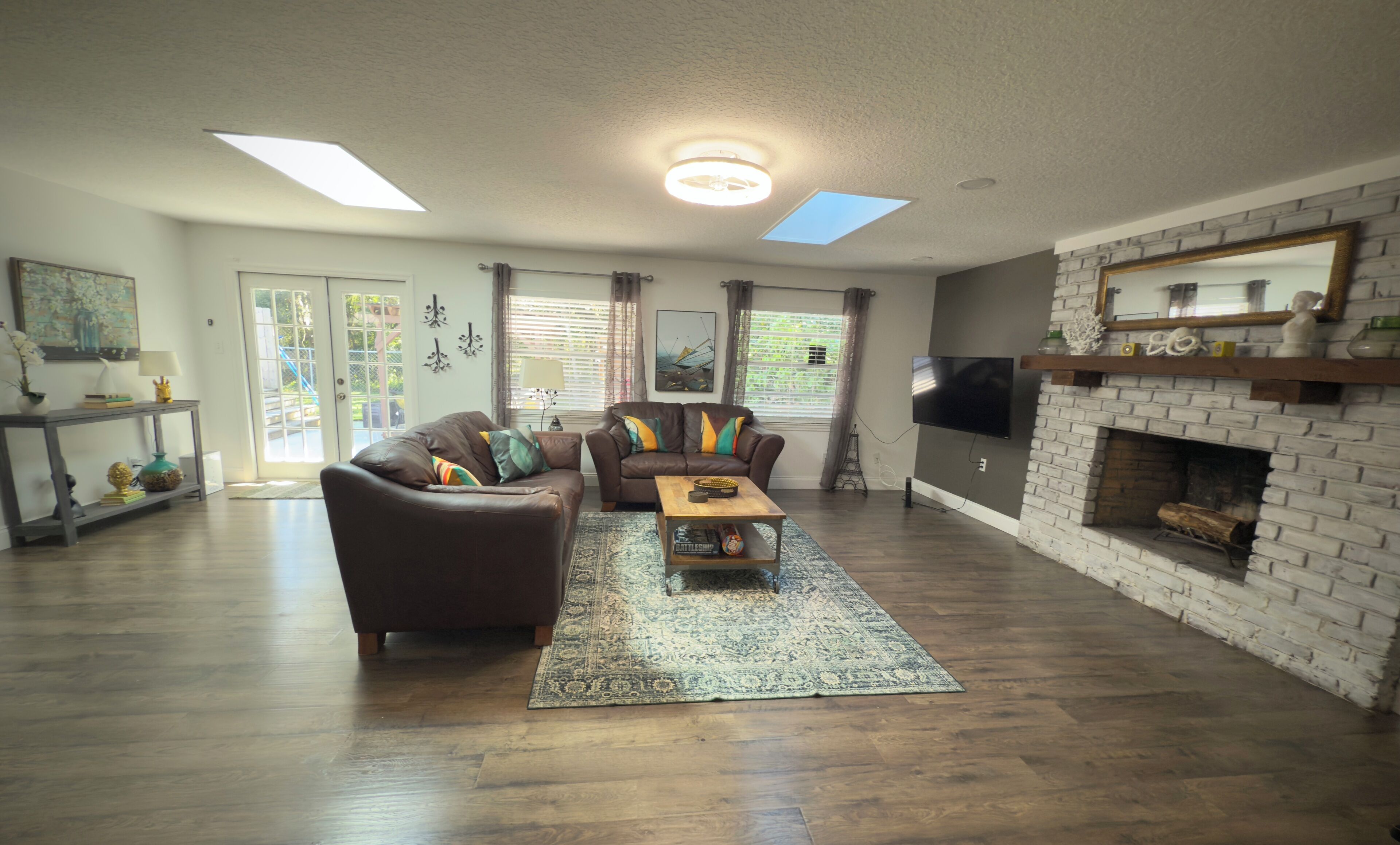 Smart TV, fireplace, books