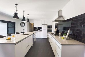 Fridge, microwave, oven, stovetop - House of Hope | Executive Home with Spa Pool (Rotorua)