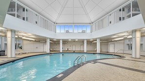 An indoor swimming pool with a clear view of the ceiling and upper floors. - Gulf Shores Plantation-East 3210 (Gulf Shores)
