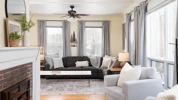 Smart TV, fireplace, books