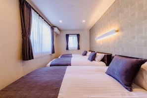 A hotel room with two beds, a window with curtains, a wall-mounted light, and an air conditioning unit. - Mt. Fuji Resort Club-RIN- (Fujikawaguchiko)