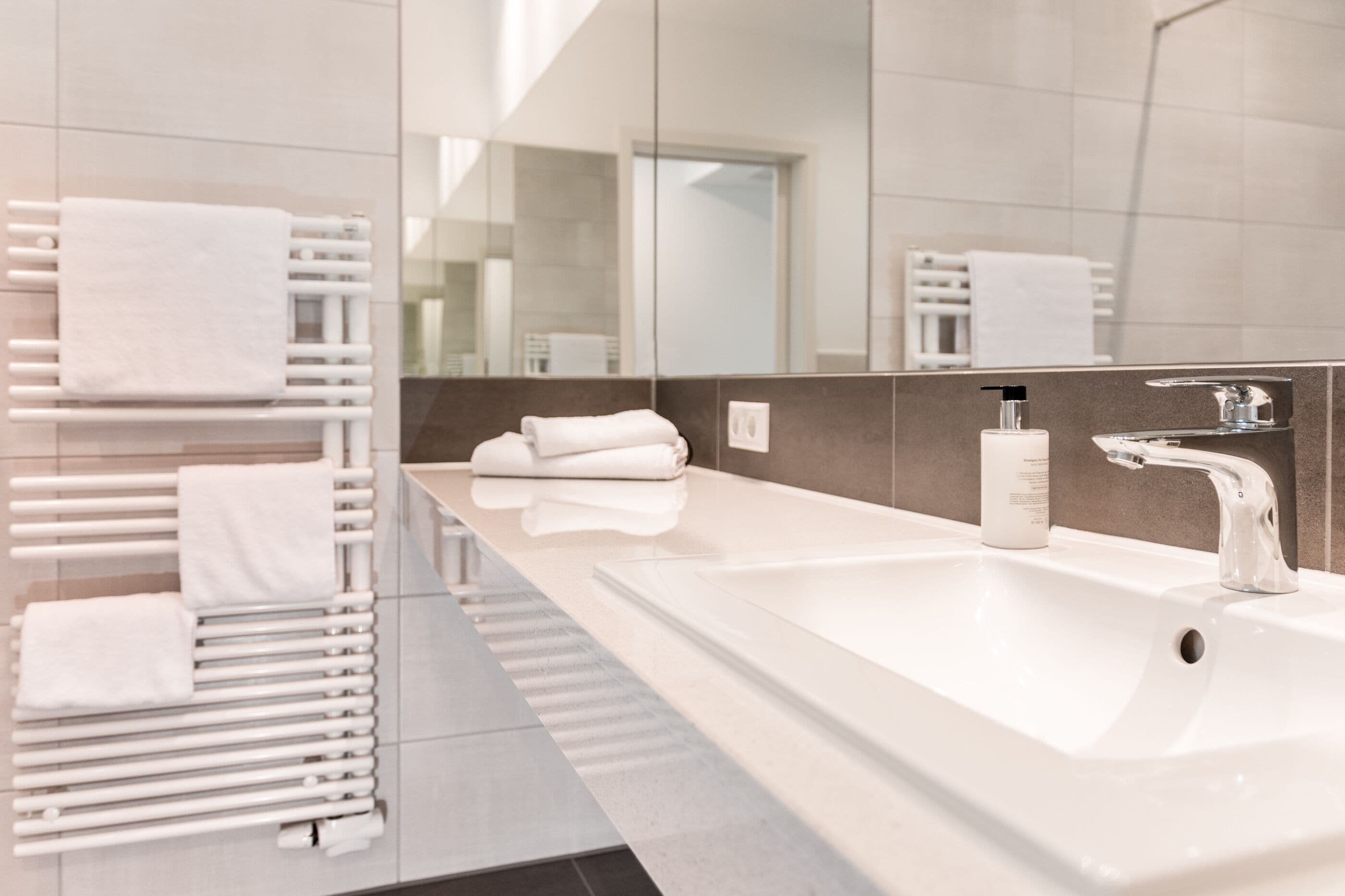eco-friendly toiletries, hair dryer, heated floors, towels