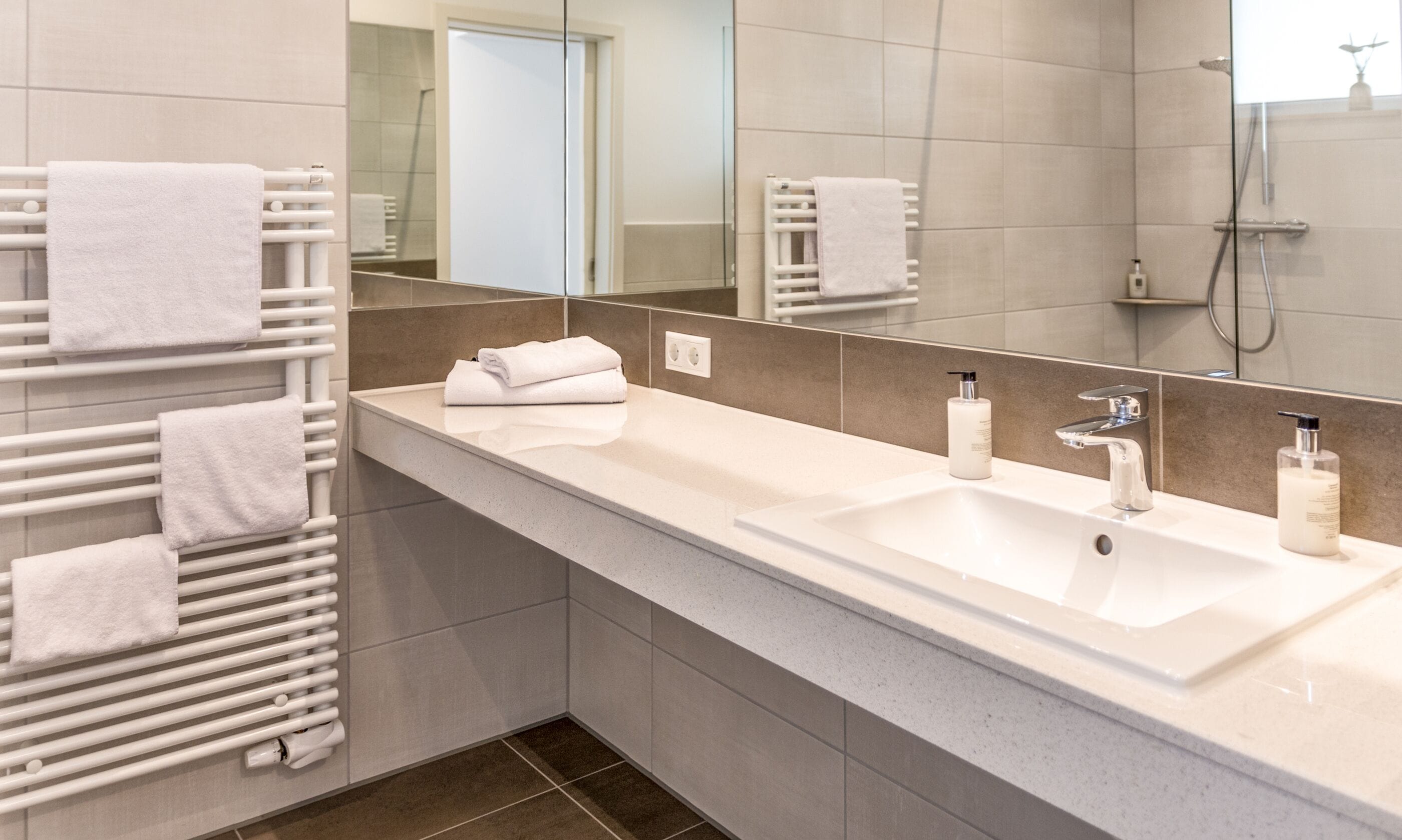 eco-friendly toiletries, hair dryer, heated floors, towels