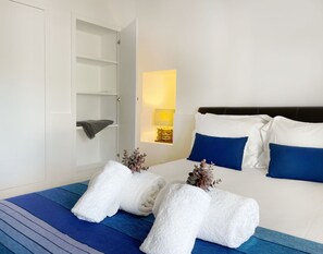 2 habitaciones, tabla de planchar con plancha y cuna de viaje 