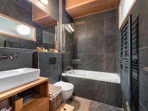 Hair dryer, slippers, towels
