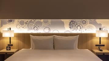 Premium bedding, down comforters, in-room safe, blackout drapes